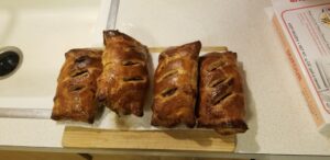 4 cooked hand pies with golden brown crust