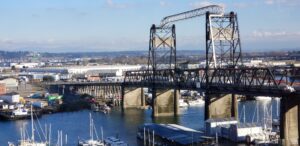 Tacoma water view of Foss Waterway with boats and Murray Morgan Bridge